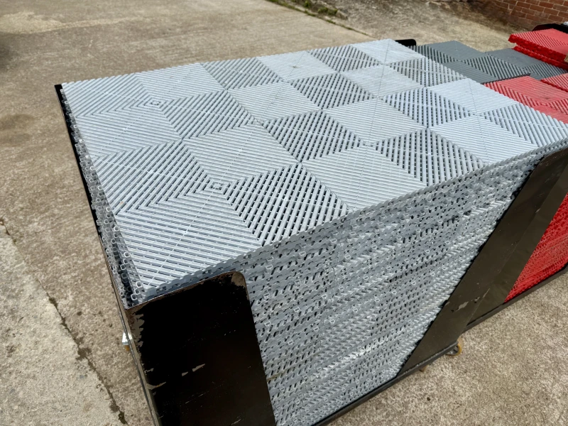 Swisstrax flooring tiles on trollies
