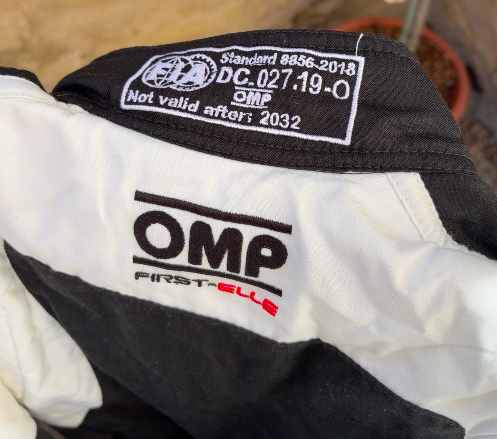 Combinaison OMP First Elle noir/blanc taille 42