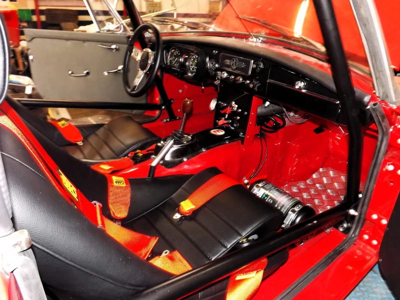 Historic 1963 MGB competition car with FIA PTH