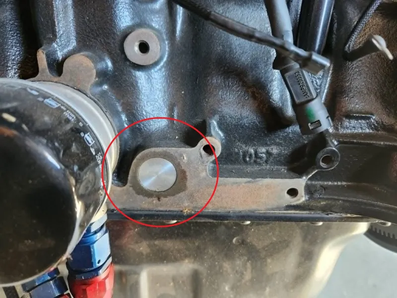 XU10J4 lower engine return line plug