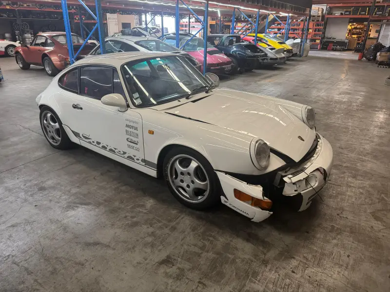 A 1990 Porsche 964 3.6 with 191,000 km.
