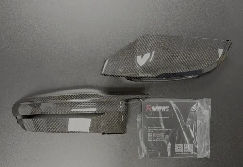 New Akrapovič Carbon Fibre Mirror Cap Set for BMW M - High Gloss