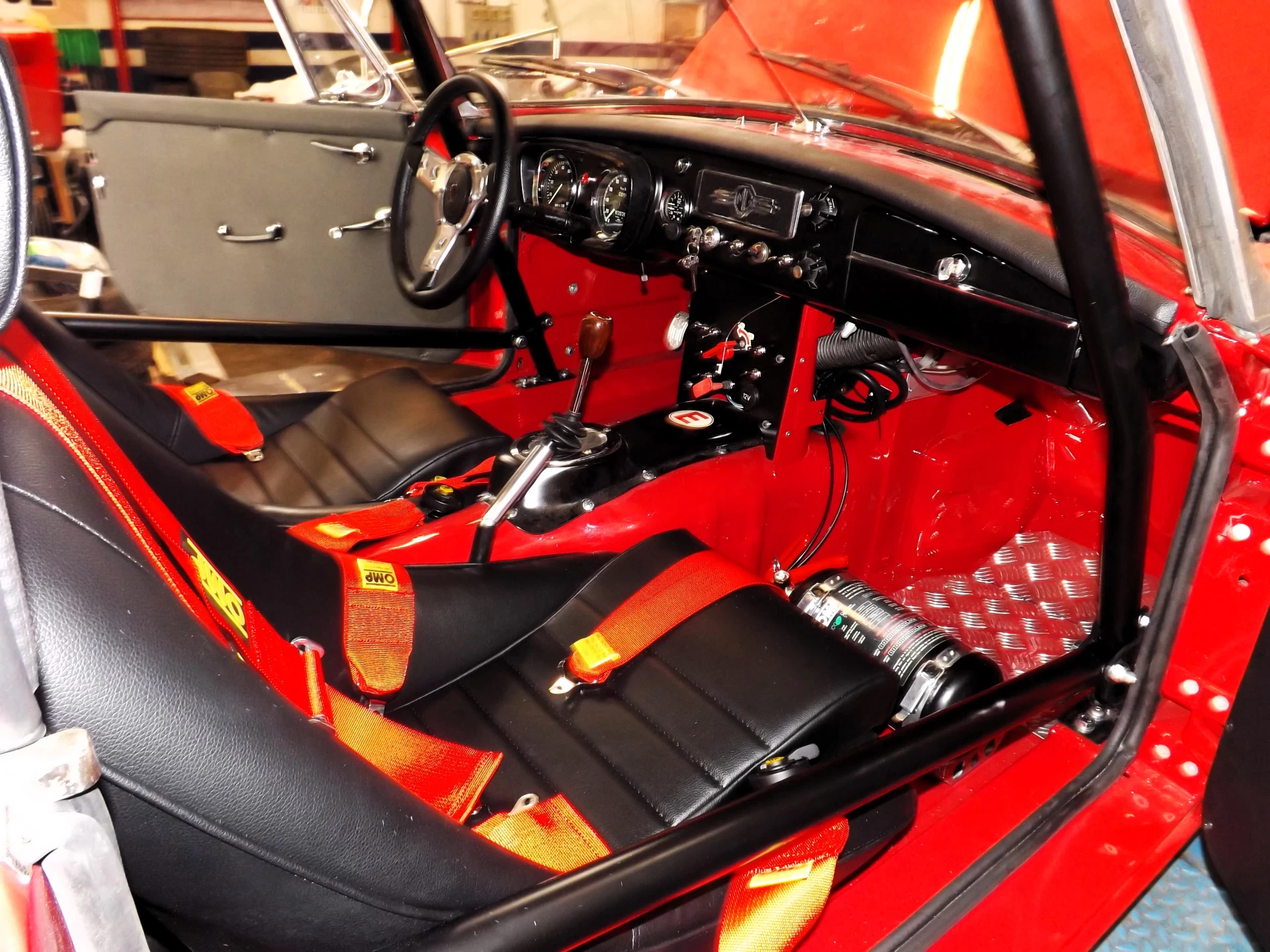 Historic 1963 MGB competition car with FIA PTH