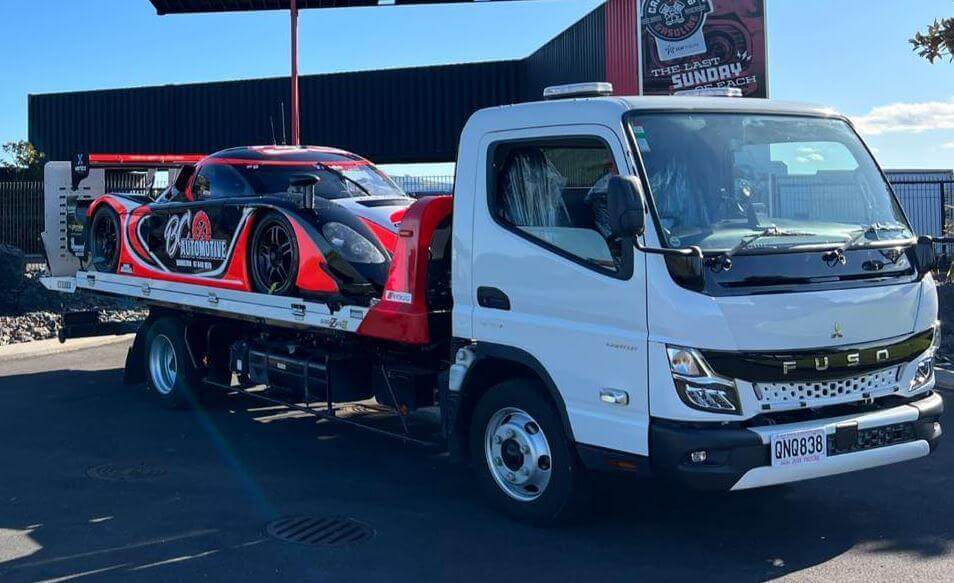 Race car on tow truck