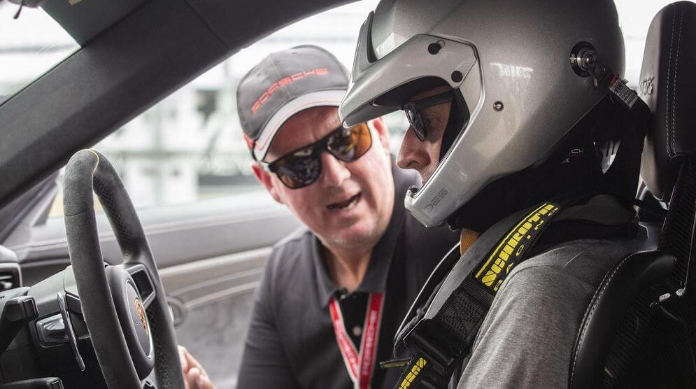 Driving instructor with a student