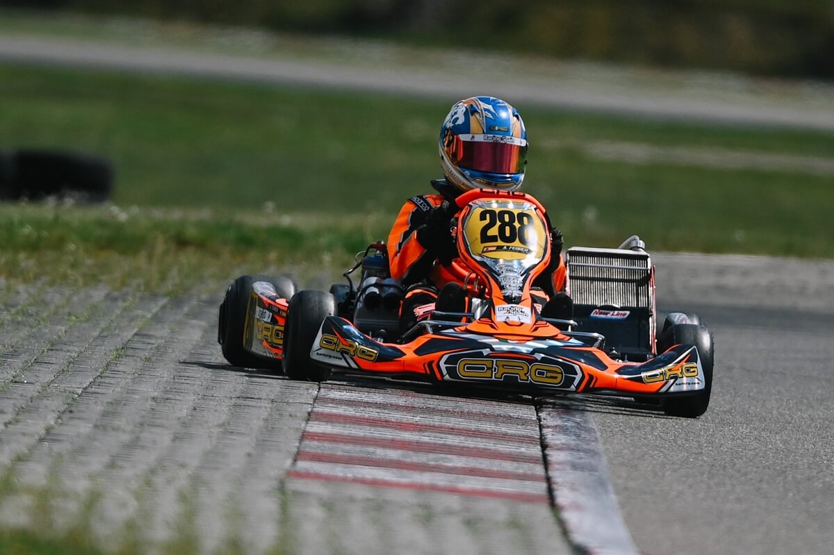 Driver wearing a karting neck brace